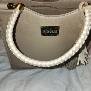 bebe Taupe Leather Tote with Braided Cream Handles and Tassel